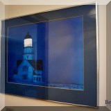 A56. Framed lighthouse print. 